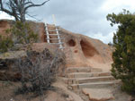 Cliff house with ladder.